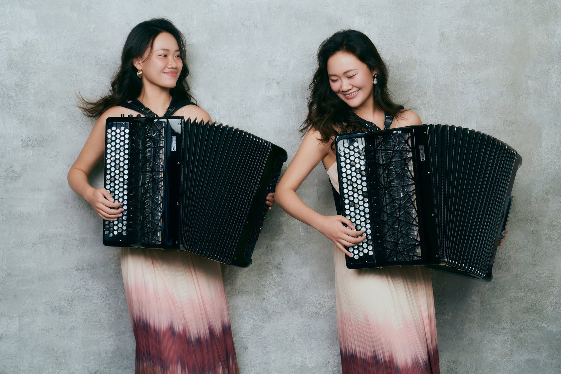 Wanchen Zhao and Wanxu Zhao with their accordions